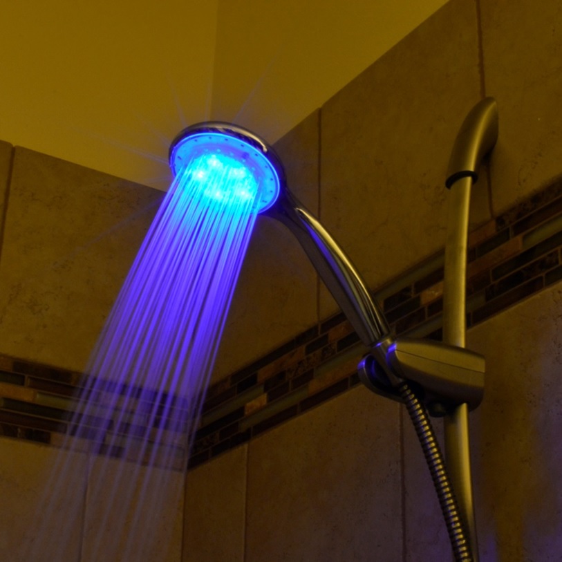 Shower head with speaker and lights